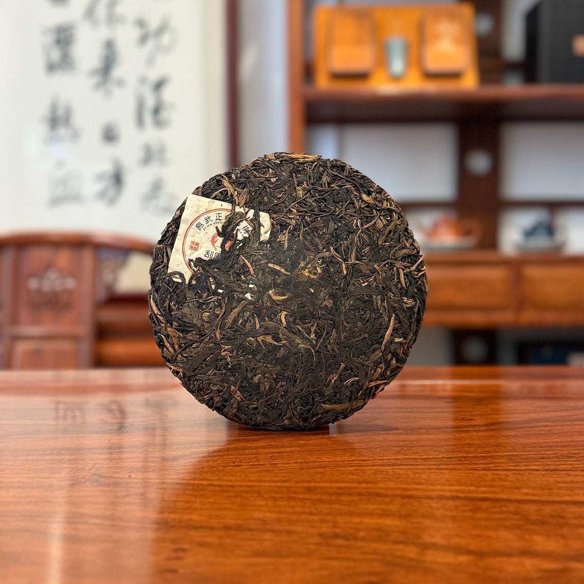 2009 Yiwu Gua Feng Zhai Raw Pu'er Tea Cake in a Round Shape