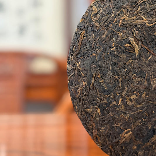 Close-up details of 2003 Bulang Mountain raw Pu-erh tea cake