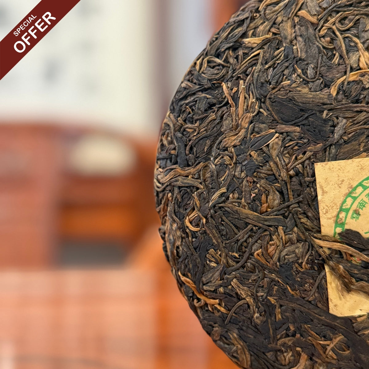 2009 Lao Ban Zhang Raw Pu'er Tea Cake displayed at the Chinese Tea Group