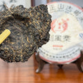Weighed Piece of 2009 Yiwu Gua Feng Zhai Raw Pu'er Tea Cake Sample for Brewing