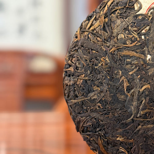Whole View of the 2009 Yiwu Gua Feng Zhai Raw Pu'er Tea Cake