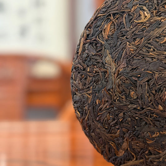 2013 Yiwu Ancient Tree Pure Material Pu'er Tea Cake displayed at Chinese Tea Group