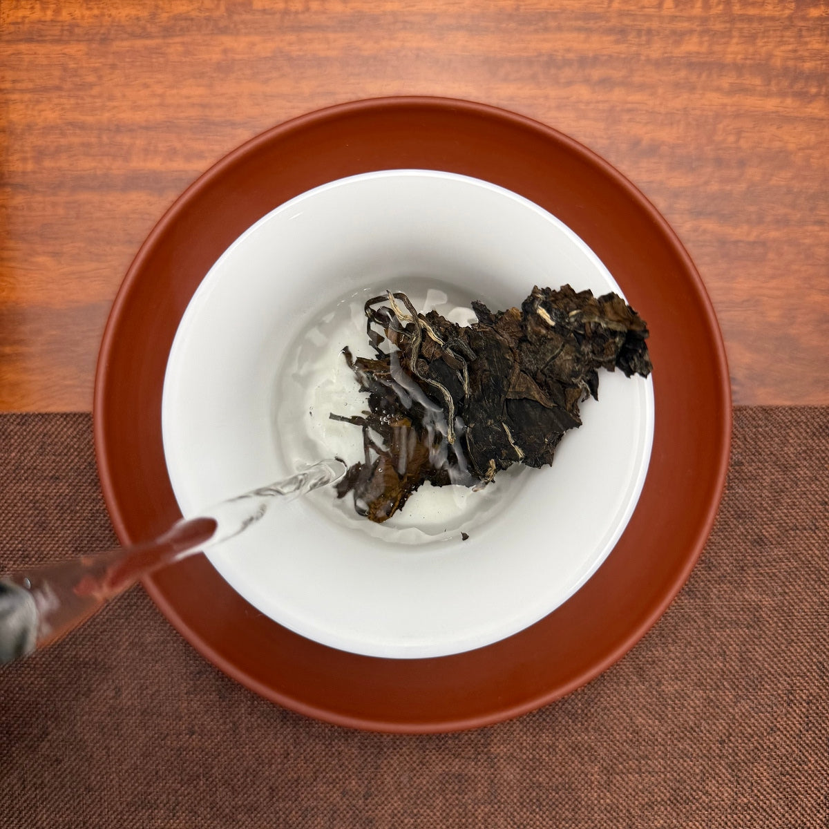 Brewing 2015 Fuding Gong Mei White Tea Cake (Tribute Eyebrow), an aged Chinese white tea