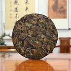 Dry leaves of 2015 Fuding Gong Mei White Tea Cake (Tribute Eyebrow) from Fuding, Fujian