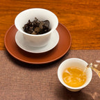 Golden tea liquor from 2015 Fuding Gong Mei White Tea Cake (Tribute Eyebrow)