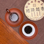 2017 Special-Grade Ripe Pu-erh Tea Cake with brewed leaves and rich tea liquor after infusion