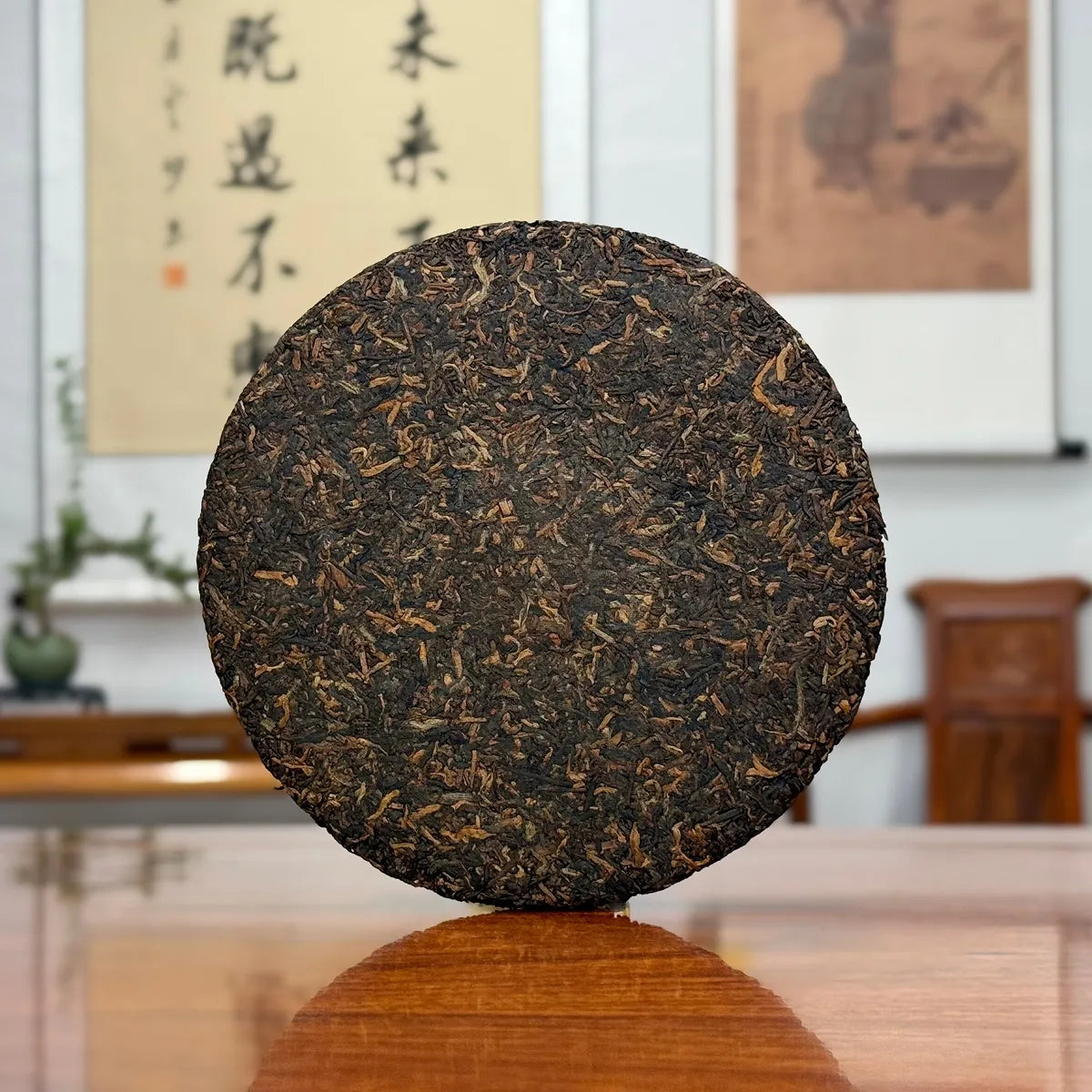 2017 Special-Grade Ripe Pu-erh Tea Cake revealing the natural appearance of aged tea leaves