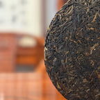 Close-up detail of the compressed leaves of the 2018 Bing Dao Ancient Tree Raw Pu'er Tea Cake