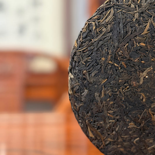 2018 'Bing Dao' Ancient Tree Raw Pu'er Tea Cake displayed at Chinese Tea Group