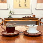 2019 Lao Ban Zhang Golden Tips Ripe Pu-erh Tea Cake with tea liquor and limited edition packaging