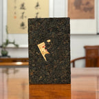 2019 Ripe Pu-erh Tea Brick close-up showing compressed tea texture details