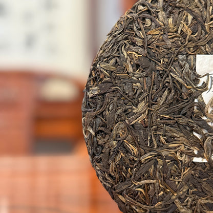 2019 Teng Tiao Ancient Tree Raw Pu-erh Tea Cake - Close-Up of Dry Leaves