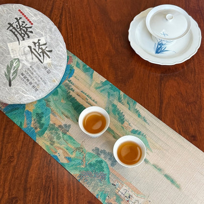 2019 Teng Tiao Ancient Tree Raw Pu-erh Tea Cake and Brewed Tea Liquor