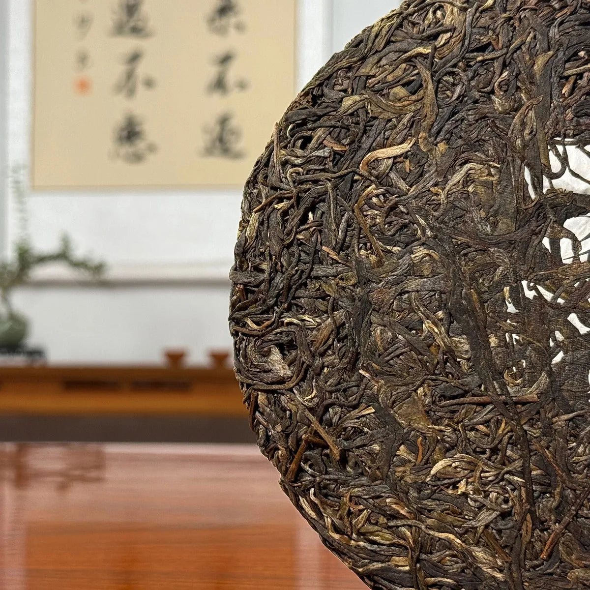 Dry leaves of the 2019 Xi Niu Tang Ancient Tree Raw Pu-erh Tea Cake