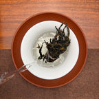 2019 Yunnan Qizi Bing Raw Pu-erh Tea Cake (Sheng) being brewed at a Chinese Tea Group tea house