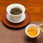 2019 Yunnan Qizi Bing Raw Pu-erh Tea Cake (Sheng) brewed tea liquor with clear amber color