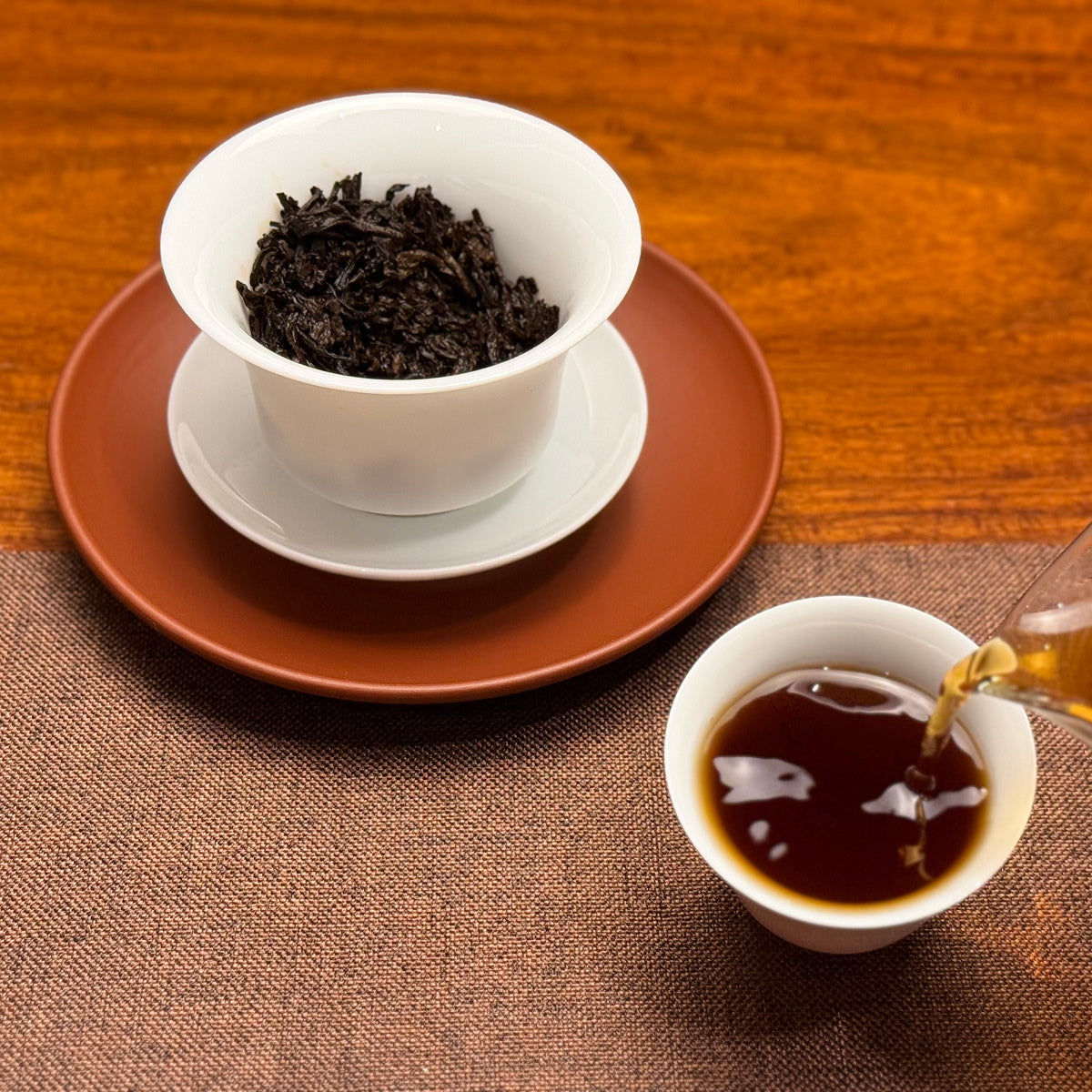 2019 Yunnan Qizi Bing Ripe Pu-erh Tea Cake (Shou) bright ruby-red tea liquor after brewing