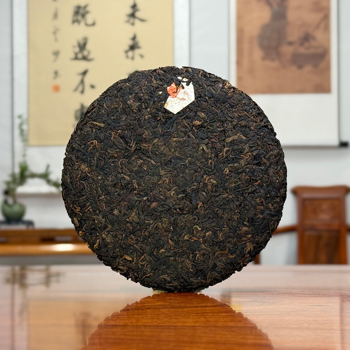 2020 Arbor Tree Ripe Pu-erh Tea Cake (Shou) with the inner ticket and compressed tea details