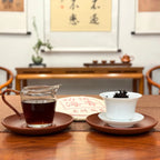 2020 Menghai Ripe Pu-erh Tea Cake (Shou) showing black tea-like liquor and brewed tea leaves