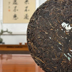 2020 Yiwu Mahei Raw Pu-erh Tea Cake dry leaves showing the tight structure and appearance of single-origin tea