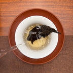 2021 Imperial-Grade Ripe Pu-erh Tea Cake (Shou) brewed tea liquor with bright ruby-red color
