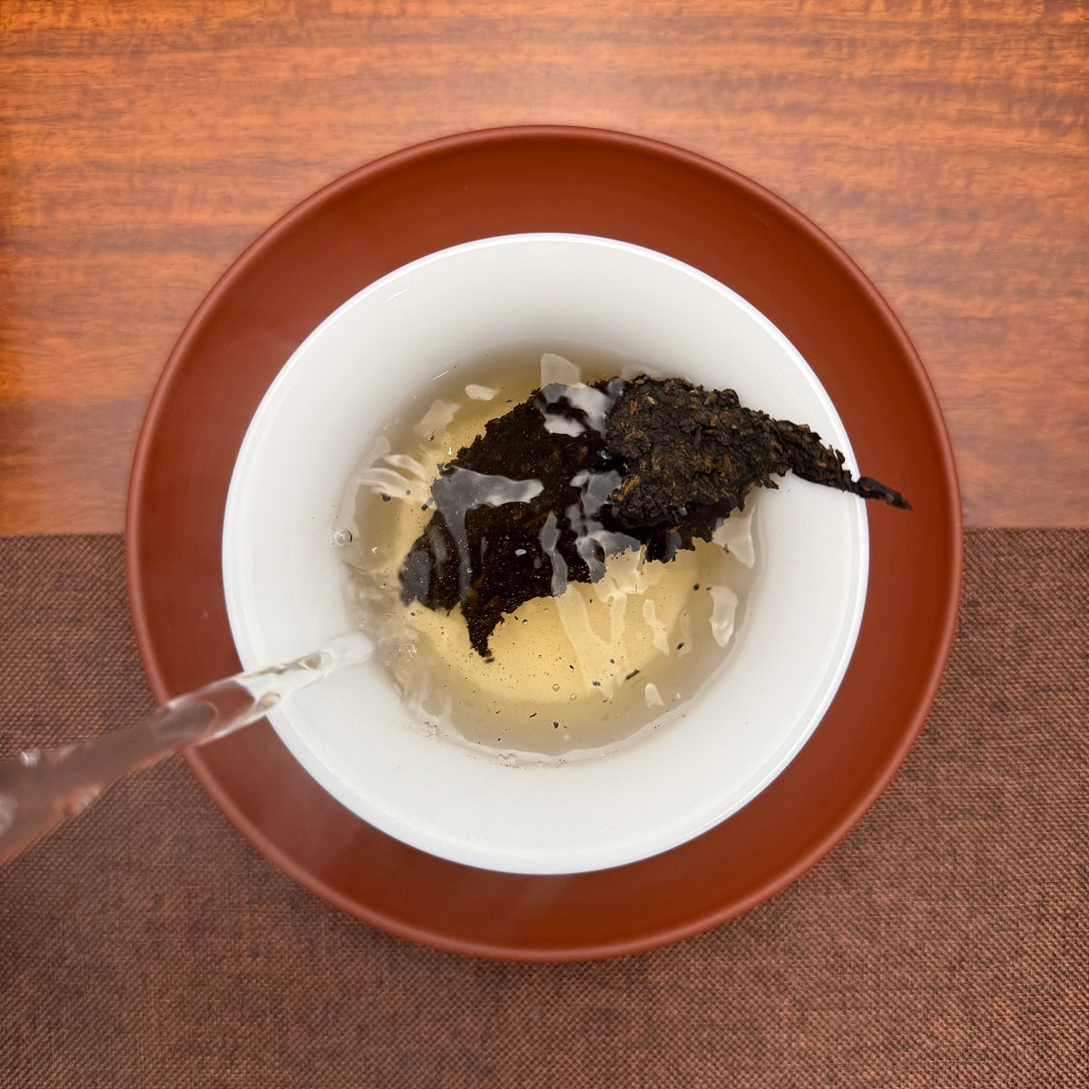 2021 Imperial-Grade Ripe Pu-erh Tea Cake (Shou) brewed tea liquor with bright ruby-red color