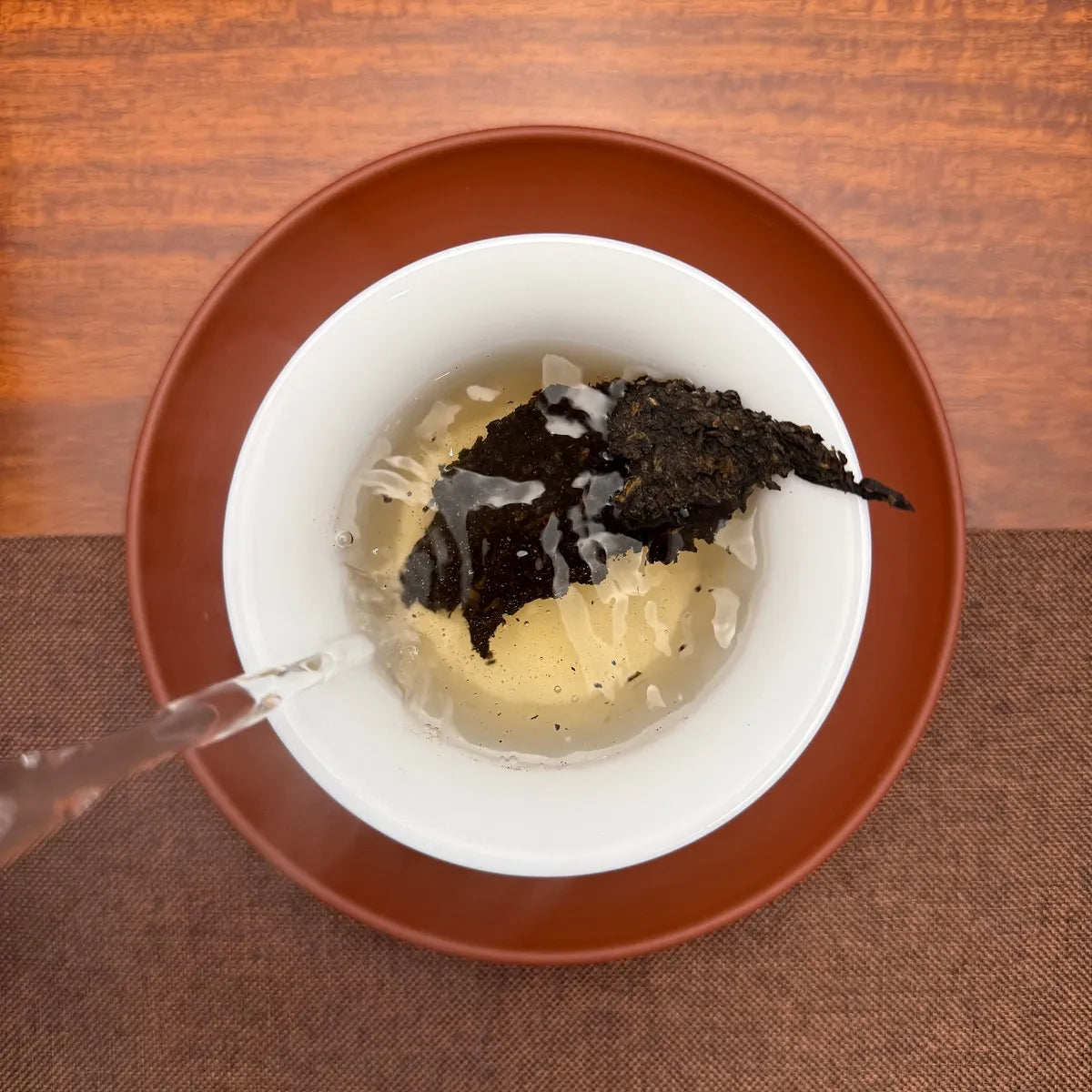 2021 Imperial-Grade Ripe Pu-erh Tea Cake (Shou) brewed tea liquor with bright ruby-red color