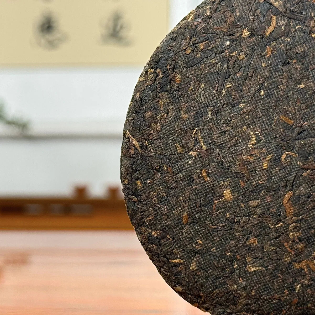 2021 Imperial-Grade Ripe Pu-erh Tea Cake (Shou) close-up showing fine buds and detailed tea leaf texture