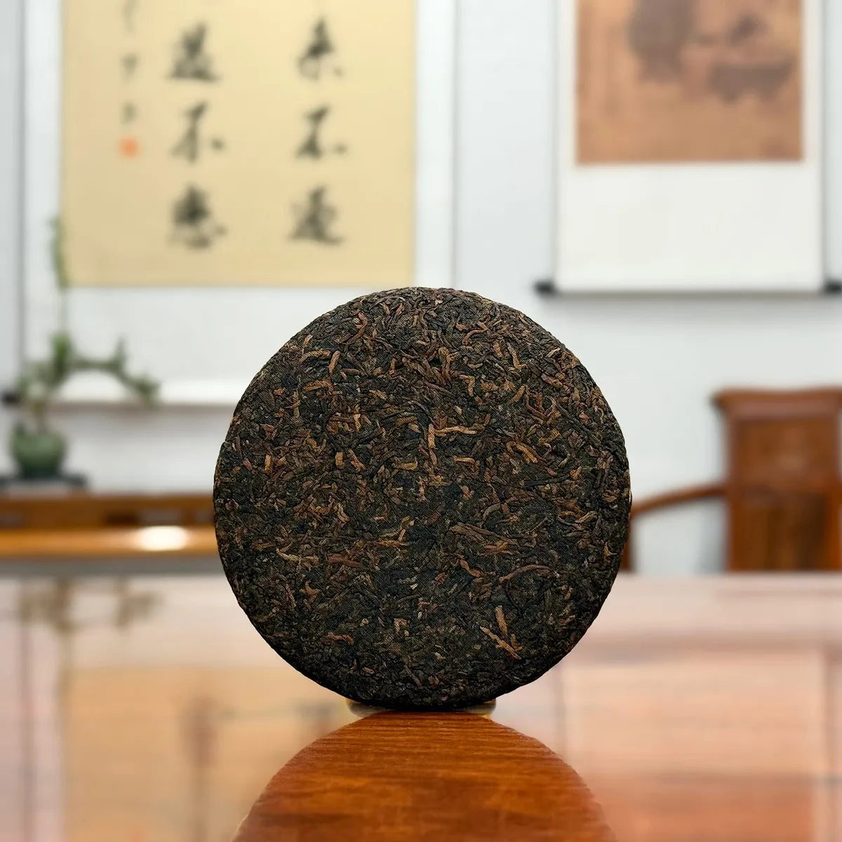 2021 Imperial-Grade Ripe Pu-erh Tea Cake (Shou) showing the full tea cake shape and fine tea details