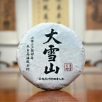 2023 Da Xue Shan Ancient Tree Raw Pu-erh Tea Cake product image by Chinese Tea Group