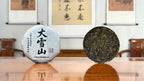 2023 Da Xue Shan Ancient Tree Raw Pu-erh Tea Cake in a traditional Chinese tea house setting