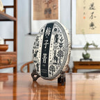 2024 Mei Zi Qing Raw Pu-erh Tea Cake side view showing compressed tea layers