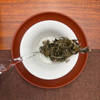 2025 Bai Mu Dan White Tea Cake undergoing traditional Fuding brewing process.