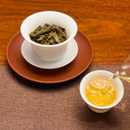2025 Raw Pu-erh Tea Cake (Sheng Pu'er) brewed tea liquor with clear golden color