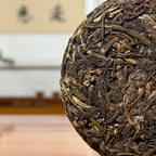2026 Bulang Mountain Raw Pu-erh Tea Cake, detailed view of tea leaves and natural leaf structure
