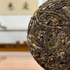 2026 Bulang Mountain Raw Pu-erh Tea Cake, detailed view of tea leaves and natural leaf structure