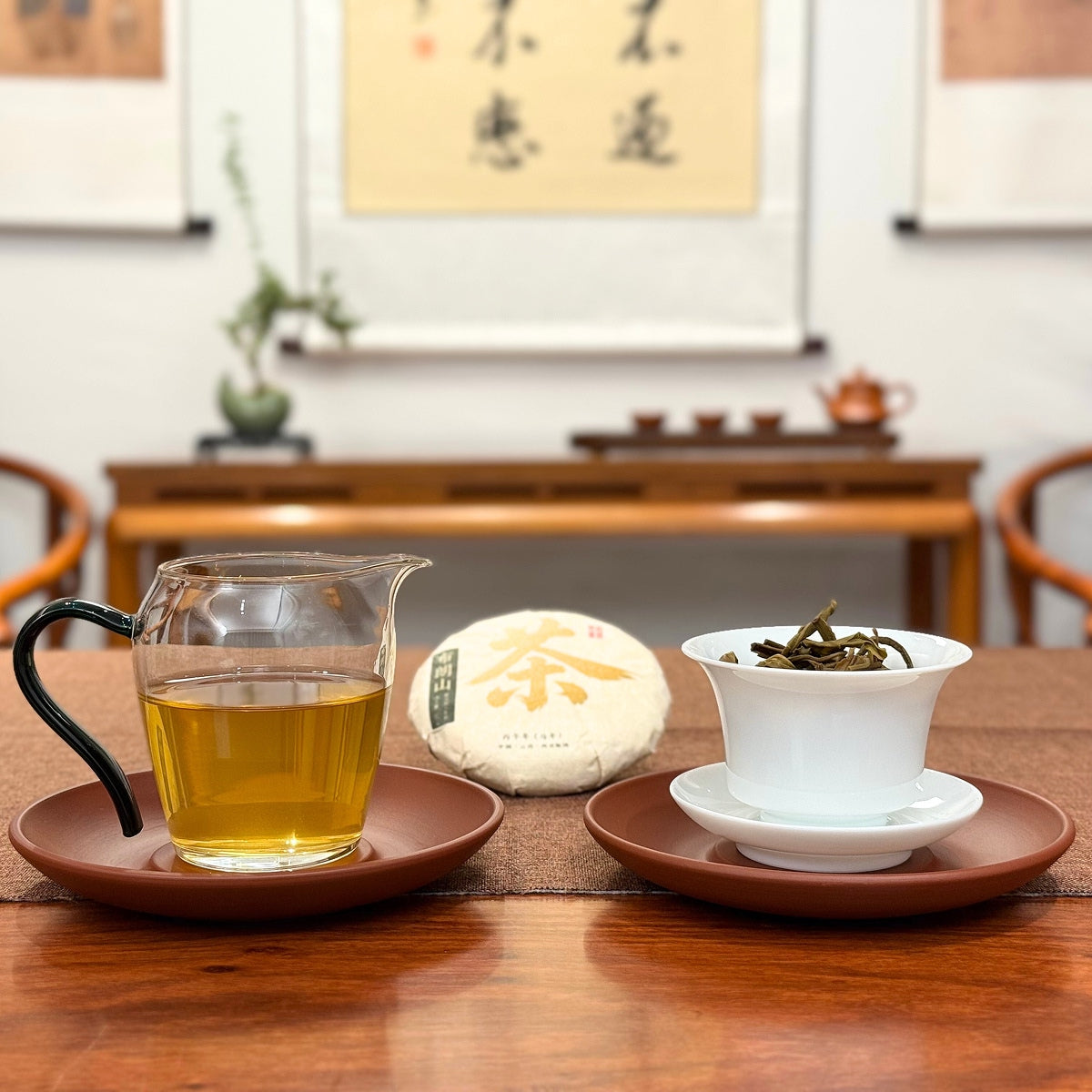 2026 Bulang Mountain Raw Pu-erh Tea Cake with tea liquor and limited edition packaging