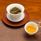 2026 Bulang Mountain Raw Pu-erh Tea Cake, golden tea liquor after brewing