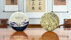 2026 Yunnan Yue Guang Bai White Tea Cake (Moonlight White) displayed in a traditional Chinese tea house