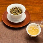 2026 Yunnan Yue Guang Bai White Tea Cake (Moonlight White) bright golden tea liquor after brewing