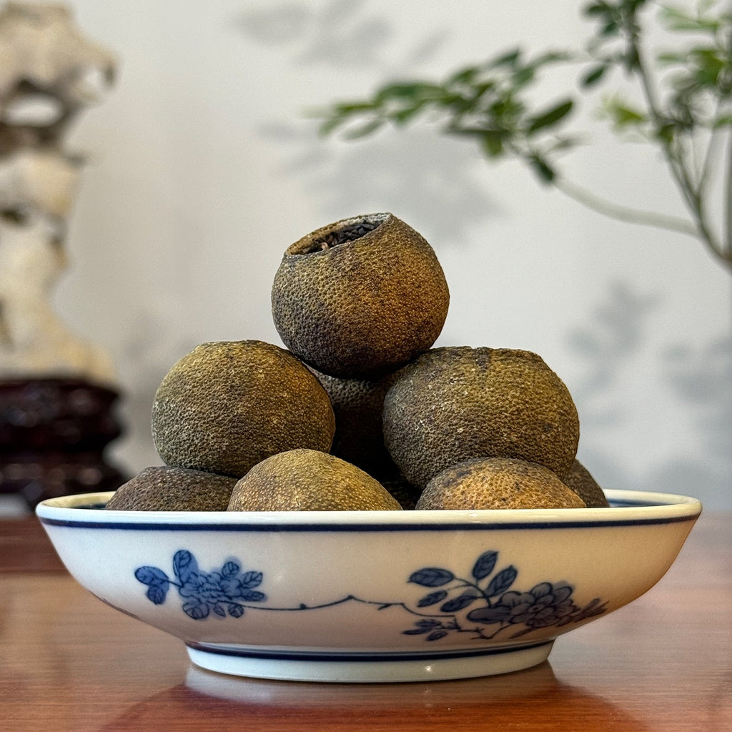 Aged Tangerine Pu-erh Tea Sample – 2021 displayed at Chinese Tea Group teahouse