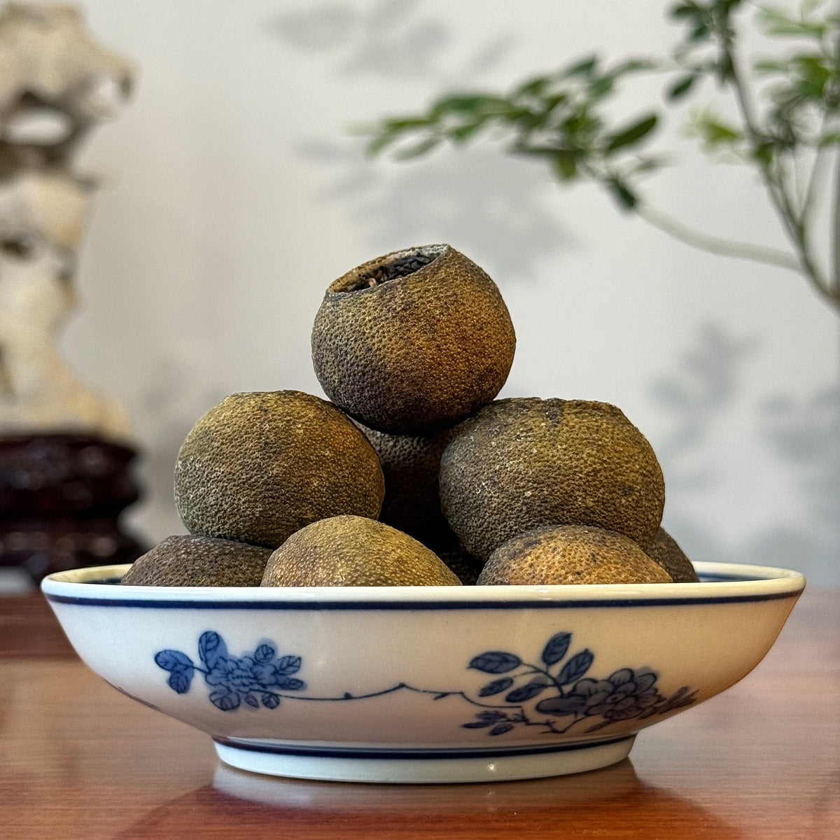 Aged Tangerine Pu-erh Tea Sample – 2021 displayed at Chinese Tea Group teahouse