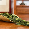 Anji Bai Cha Green Tea (Anji White Tea) dry leaves detail shot from top Chinese tea online store