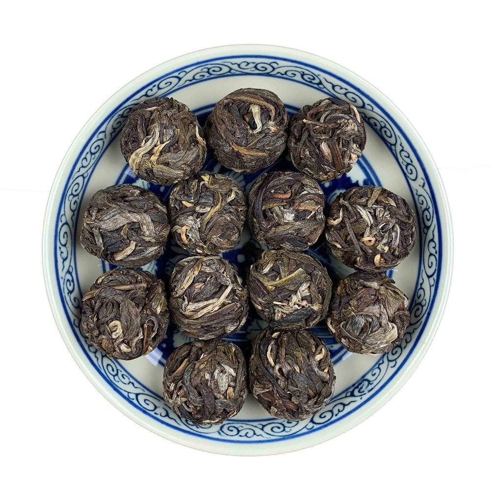 Close-up of Dragon Pearl Pu-erh Tea (Dragon Ball) 2023 Yiwu leaves