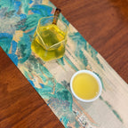 Golden tea liquor of Fujian Oolong Tea (Taiwanese variety), smooth and aromatic