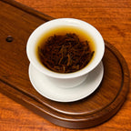 Keemun Xiang Luo Black Tea (Fragrant Spiral) brewing showing traditional Chinese tea infusion