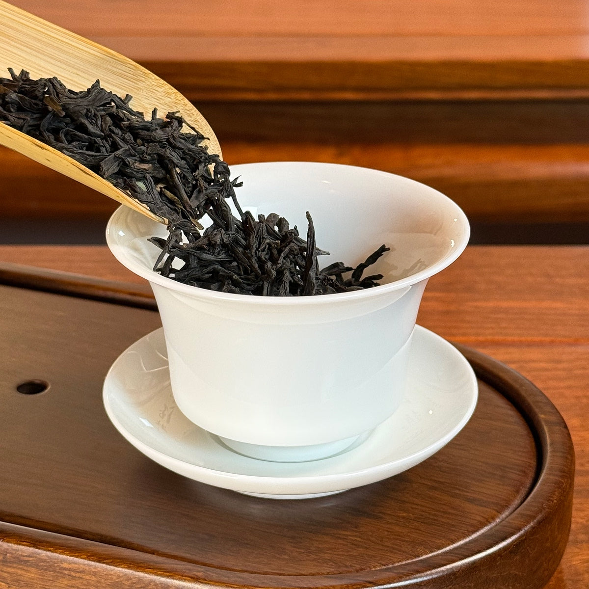 Lapsang Souchong Black Tea (Zheng Shan Xiao Zhong) Chinese red tea poured into teapot