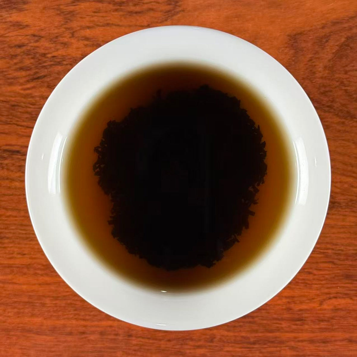 Brewing 2012 Imperial Grade Shou Pu-erh Tea in a traditional gaiwan