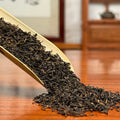 Close-up of reddish-brown dry leaves of 2012 Imperial Grade Shou Pu-erh Tea