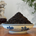 Loose Leaf Shou Pu-erh Tea, 2012 Imperial Grade sample displayed in a traditional tea house